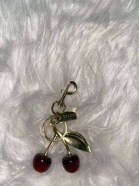Coach Cherry charm